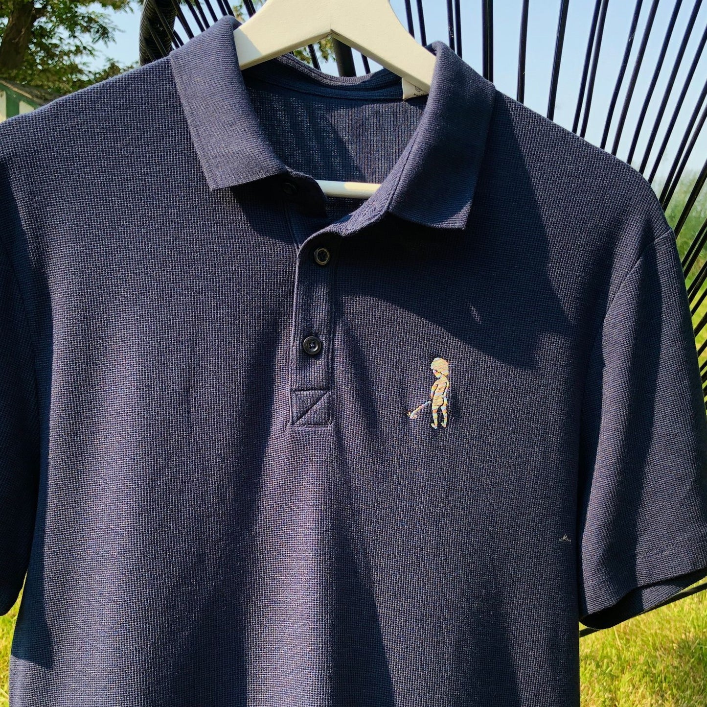 Polo léger "Ketje"™ bleu marine - logo multicolore pastel